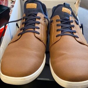 Navy blue & tan shoes.